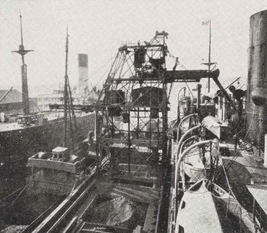 Muscoota (mechanised coal hulk) coaling SS Beltana (Italian Bulletin of Australia, 15 Dec 1926, Page 18), Sydney Harbour (1925)