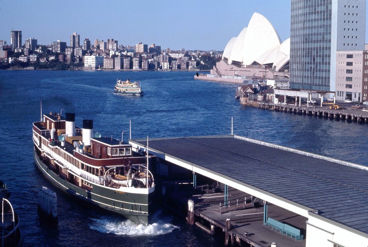 Sydney ferry BELLUBERA and KANANGRA approaching wharves at Circular Quay Sydney (1972)
