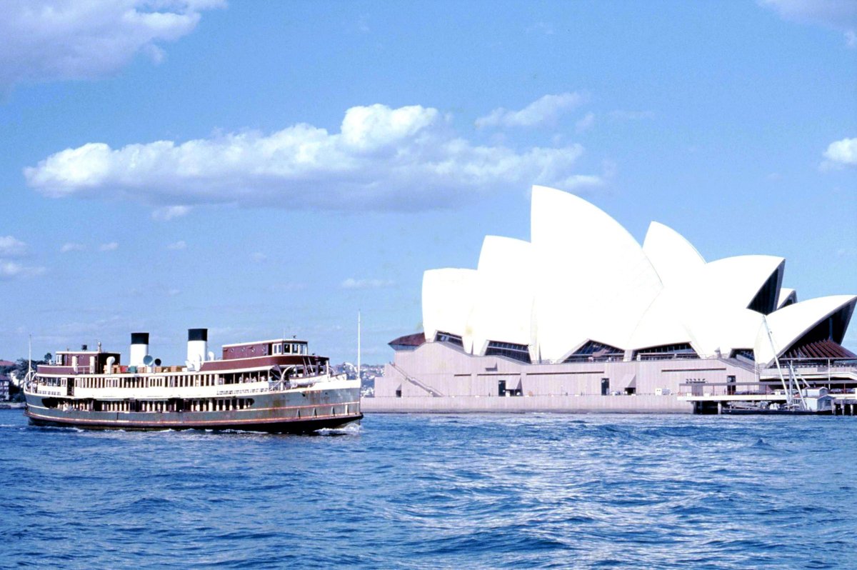 Sydney ferry BELLUBERA passing the newly opened Opera House in Sydney Cove Circular Quay (1973)