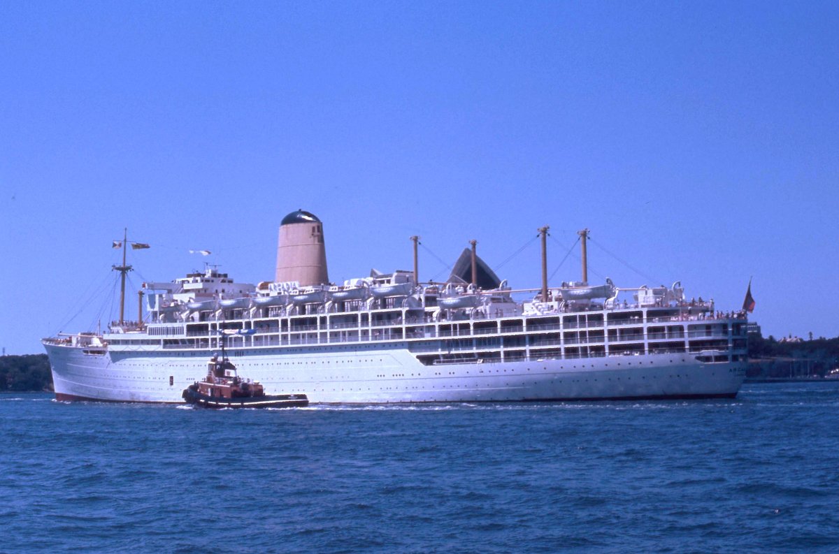 P & O Liner Arcadia & tug Wandilla just east after passing under the Harbour Bridge Sydney (1975)