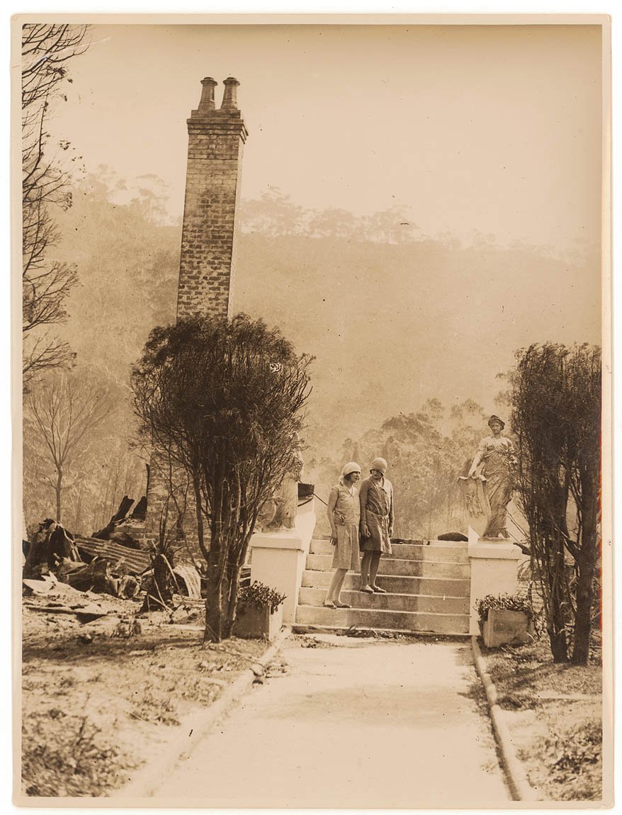 Women and ruins of house after bushfire, by Sam Hood c. 1920s - 5938678053