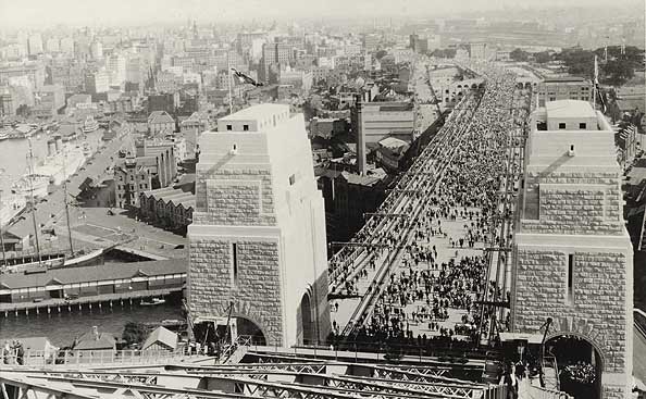 Crowds crossing the Sydney Harbour Bridge after the official opening ceremony (1932)