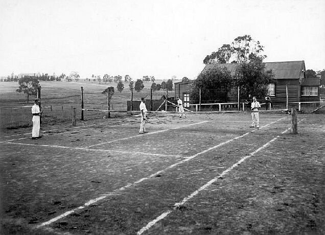 Playing tennis, Scheyville (c. 1926)