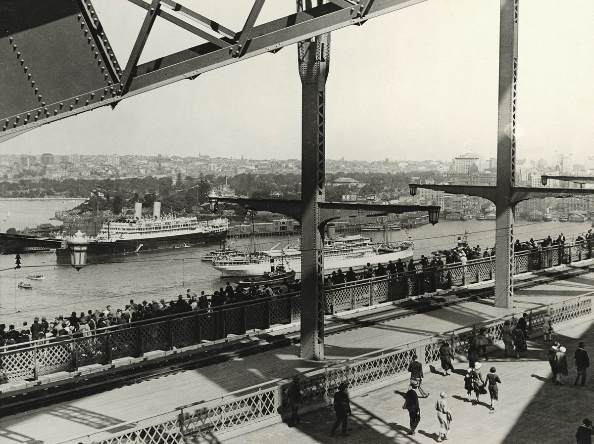 Public on Bridge and Water Pageant - Sydney Harbour Bridge opening (c. 1932)