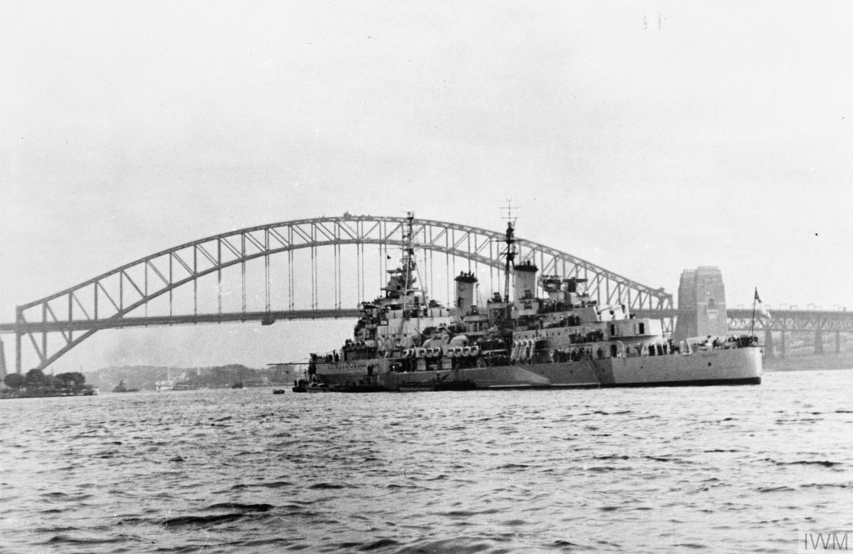 HMS BELFAST at anchor in Sydney harbour, August 1945. ABS694