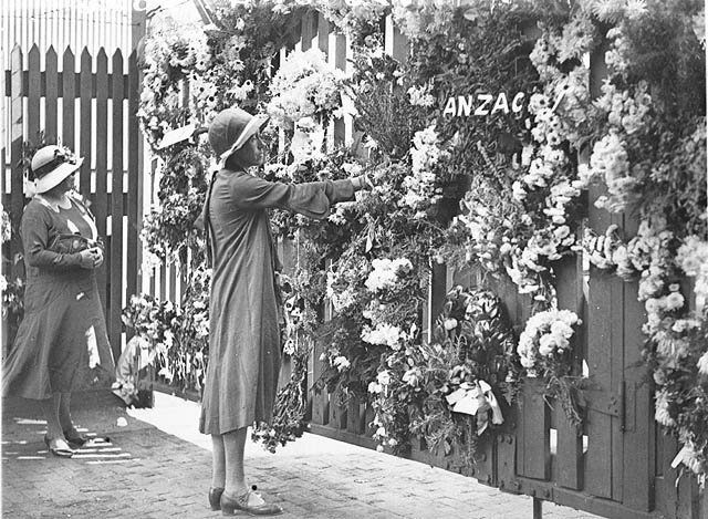 On Anzac Day, women lay wreaths on the wharf at Woolloomooloo, Sydney, from where the WW I troops departed, ca. 1931 Sam Hood, c. 1931