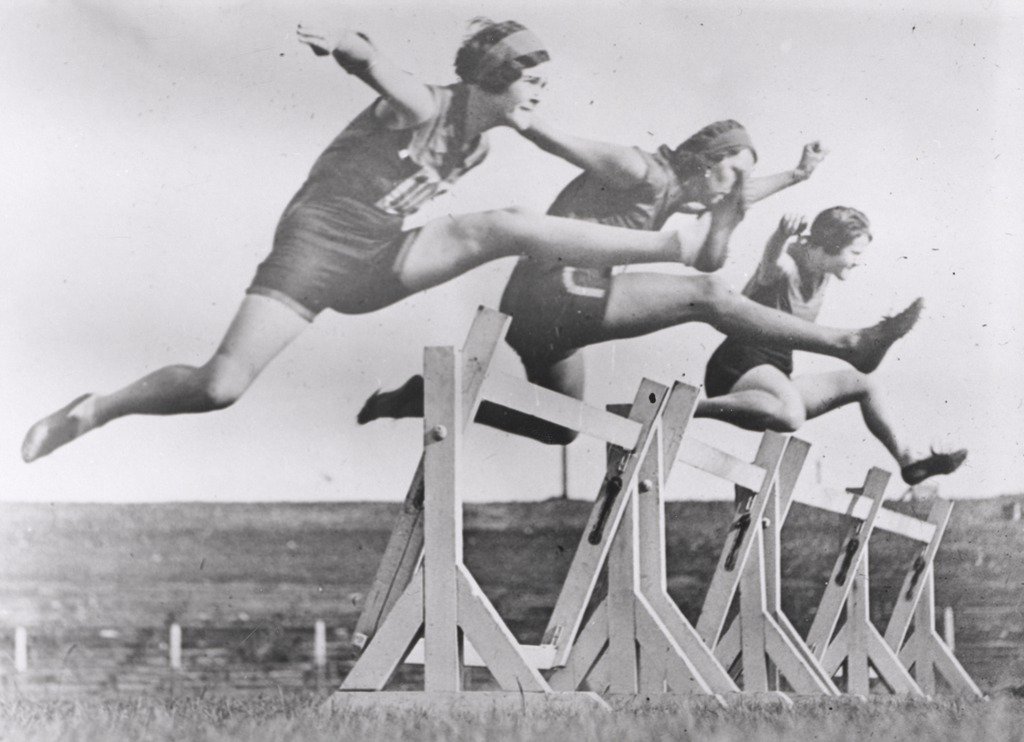 Women's hurdles race taking place at Sydney Sports Ground, New South Wales, March 1931, Moore Park