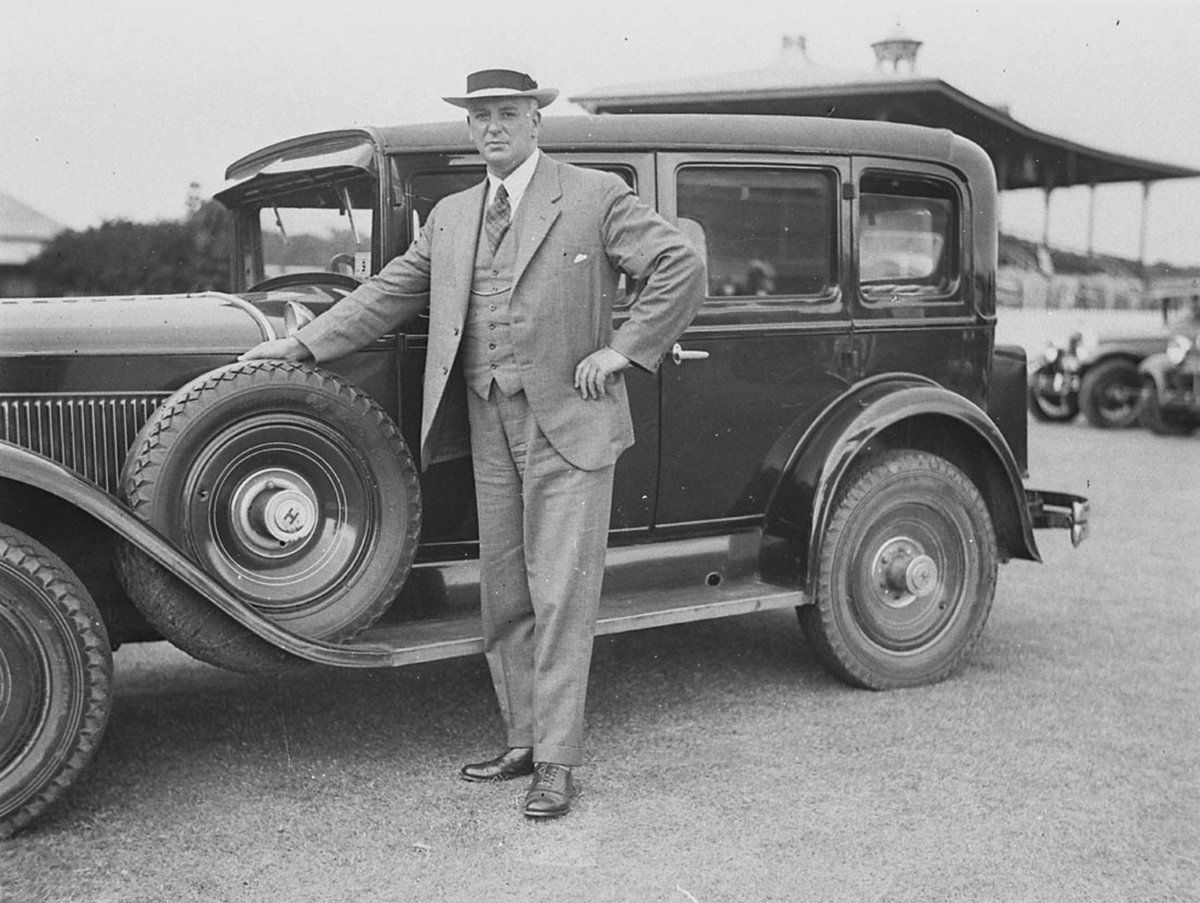 Believed to be former Federal Treasurer Ned Theodore beside his 1928 model Hudson sedan Ted Hood 2041988