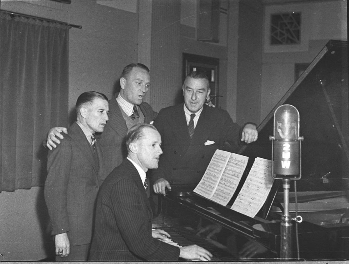 Big Four at microphone (1938)
