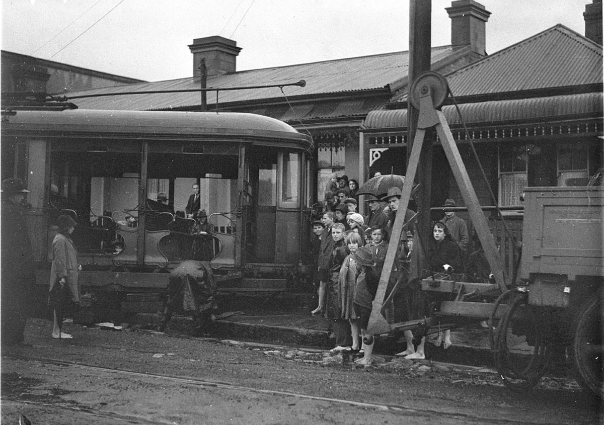 A derailed MarrickvilletoCircular Quay tram runs into house at Redfern, 1934