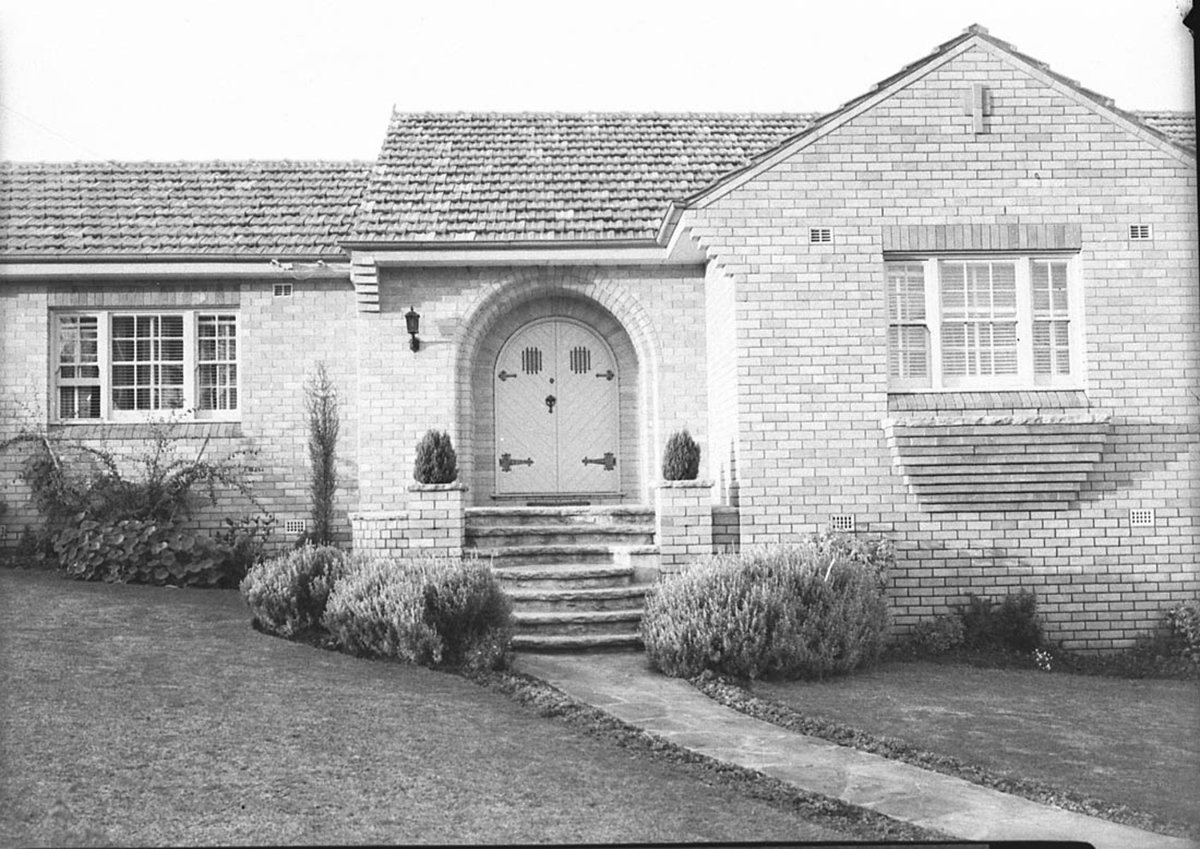 A modern brick and tile bungalow with porch taken for Building Publishing Co, Sydney (1925–57)