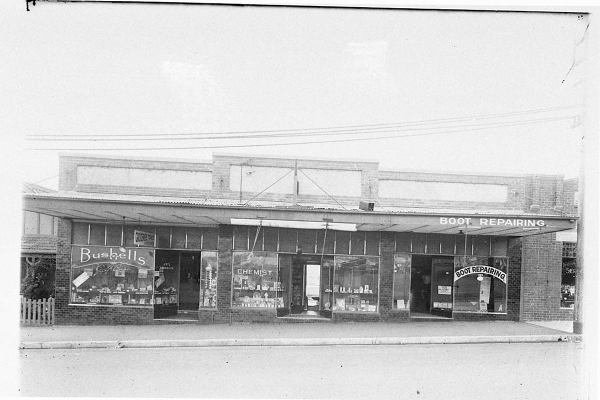 A triple shop front Golf Course grocer shop D Emanuels chemist shop and a boot repair shop We mend crepe soles (1930s)