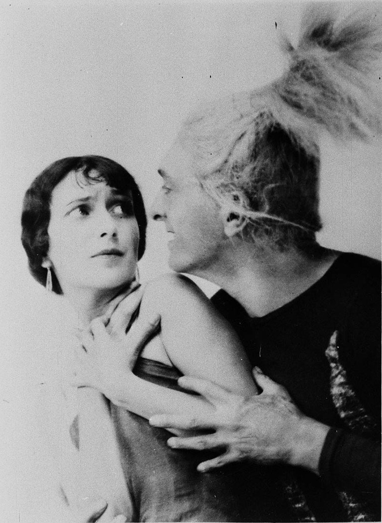 Actor and actress in love scene (1930s)