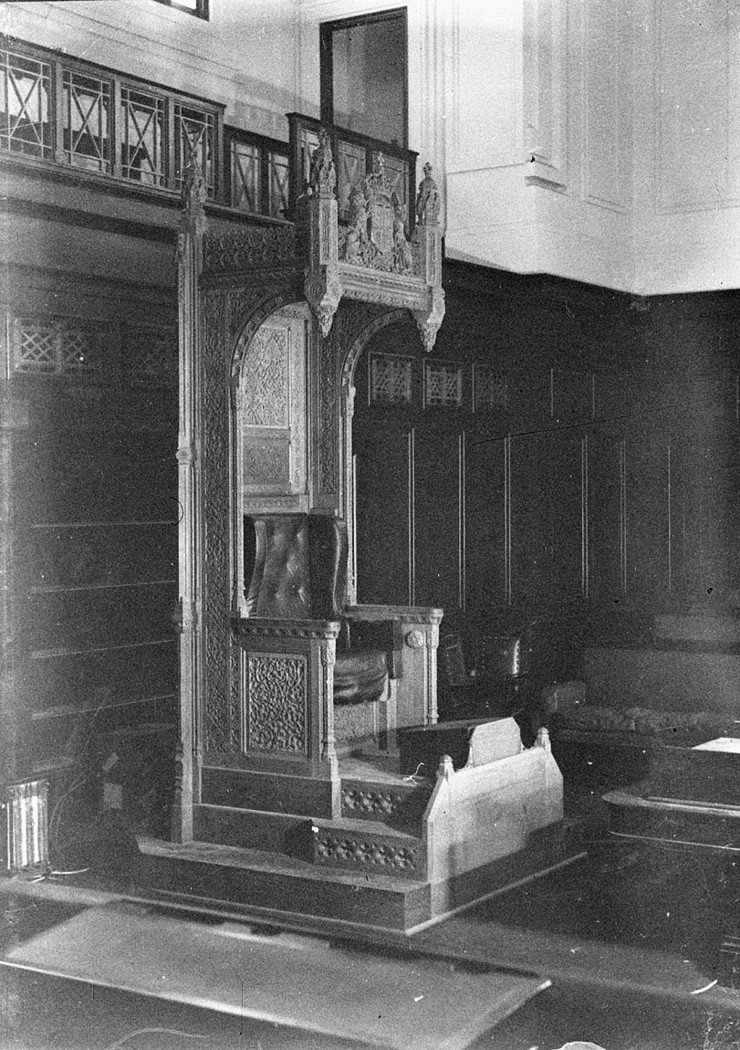 An ornate carved timber Speakers Chair in the new Parliament House, Sydney city centre (1925–57)