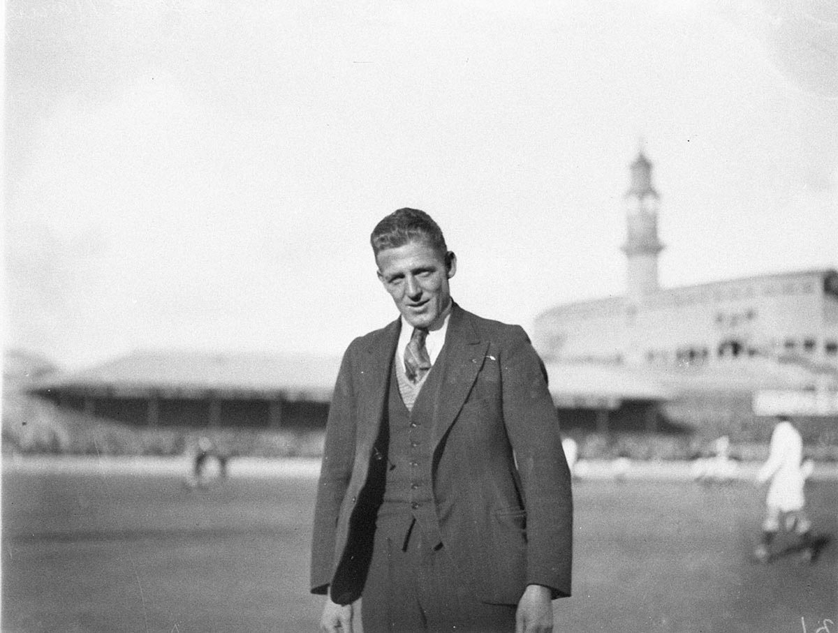 Bennie Wearing standing in the middle of Sydney Cricket Ground, Moore Park (1930s)