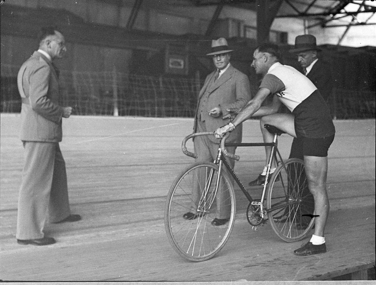 Bike riders at Sports Arena taken for Bruce Small Ltd Opperman prepares for attempt on the 24 hour unpaced world record, Surry Hills (1940)