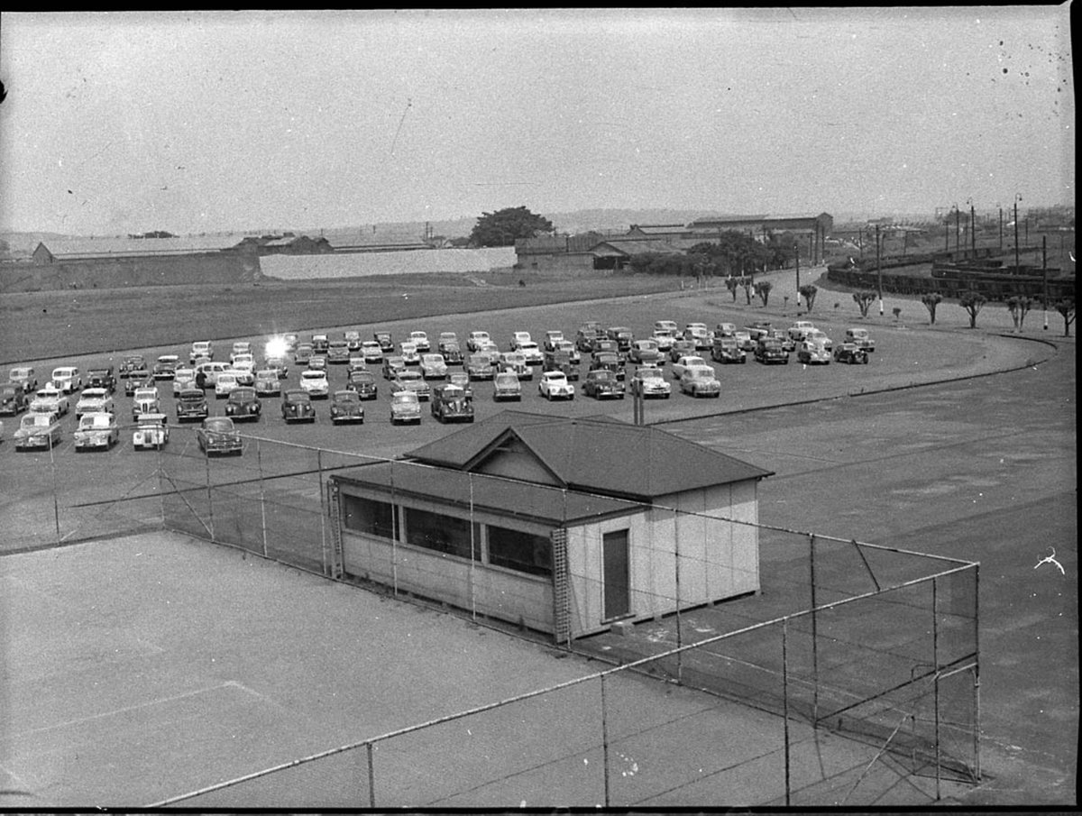 Cars parked at BHP during bus strike (1955)