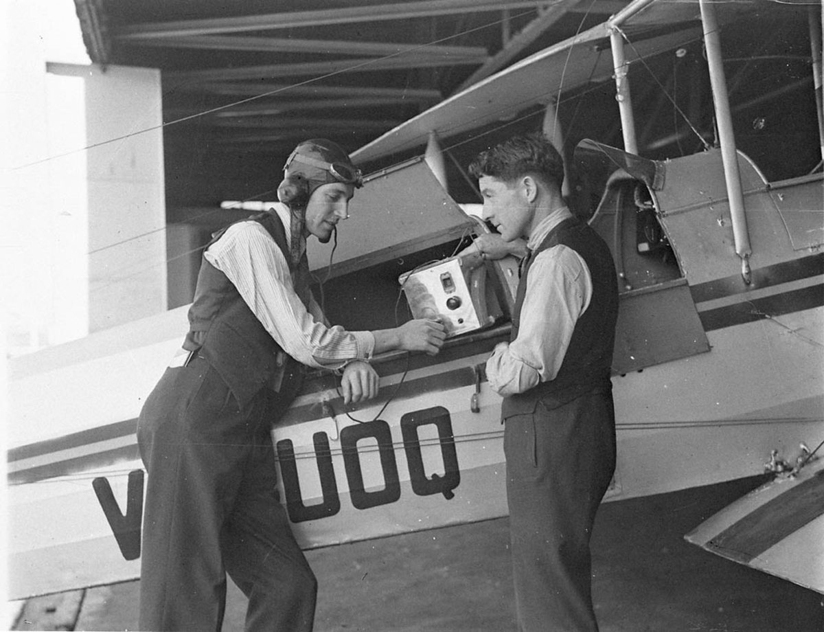 Christening of Gypsy Moth aircraft VHUOQ outside Smithys ANA hangar (1930s)