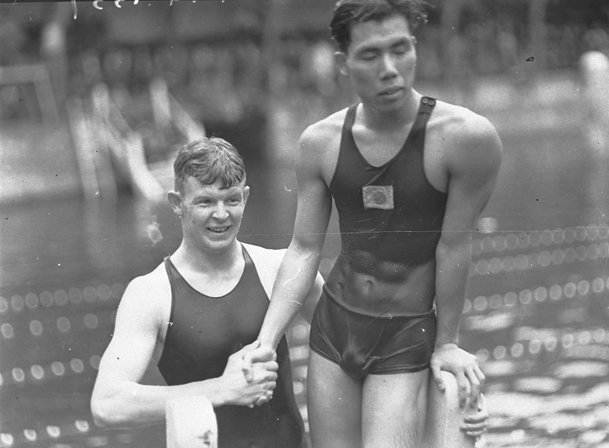 Clarke congratulates Kiyokawa on winning the backstroke championship of NSW Domain Baths (1935)