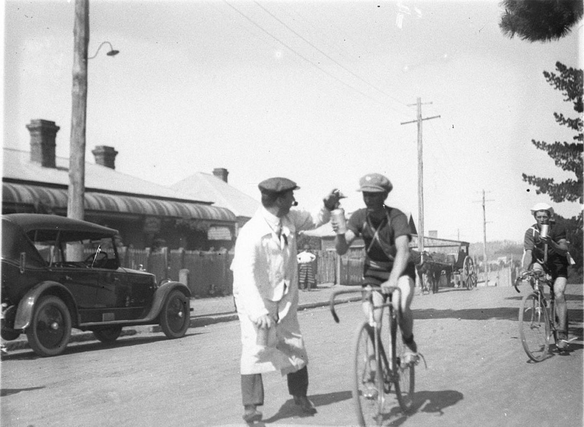 Competitors receive liquid food en route (1930s)