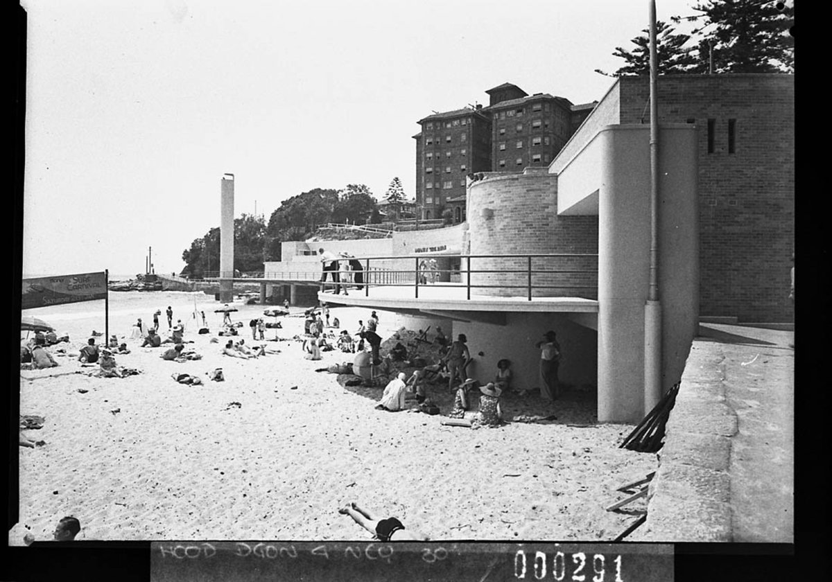 Corner of Manly Beach looking toward Fairy Bower showing the shark tower for Building Publishing Co (1939)
