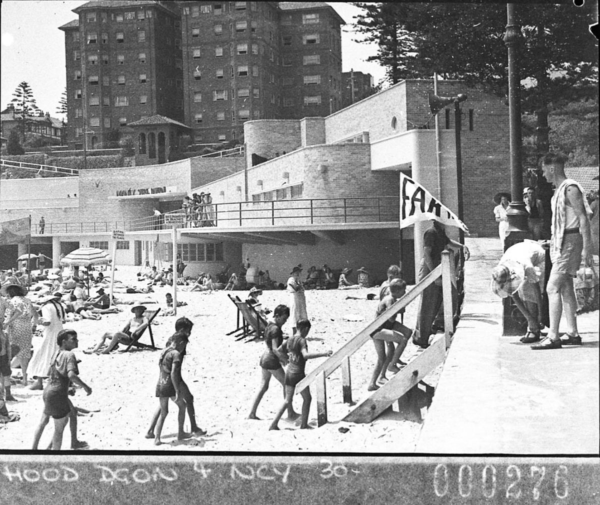 Corner of Manly Beach showing the new surfing pavilion in background for Building Publishing Co and Far West Home children leaving the beach (1939)