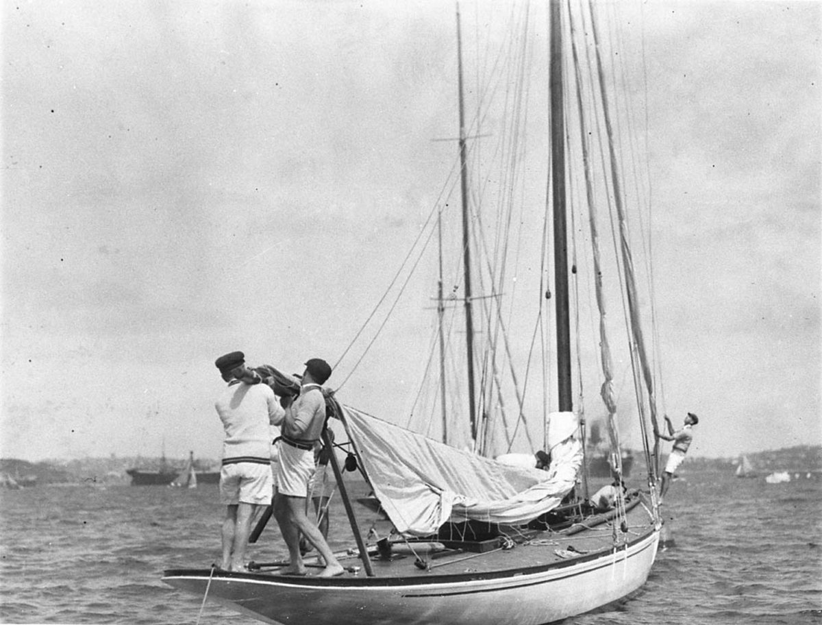 Crewmen furling sail (1930s)