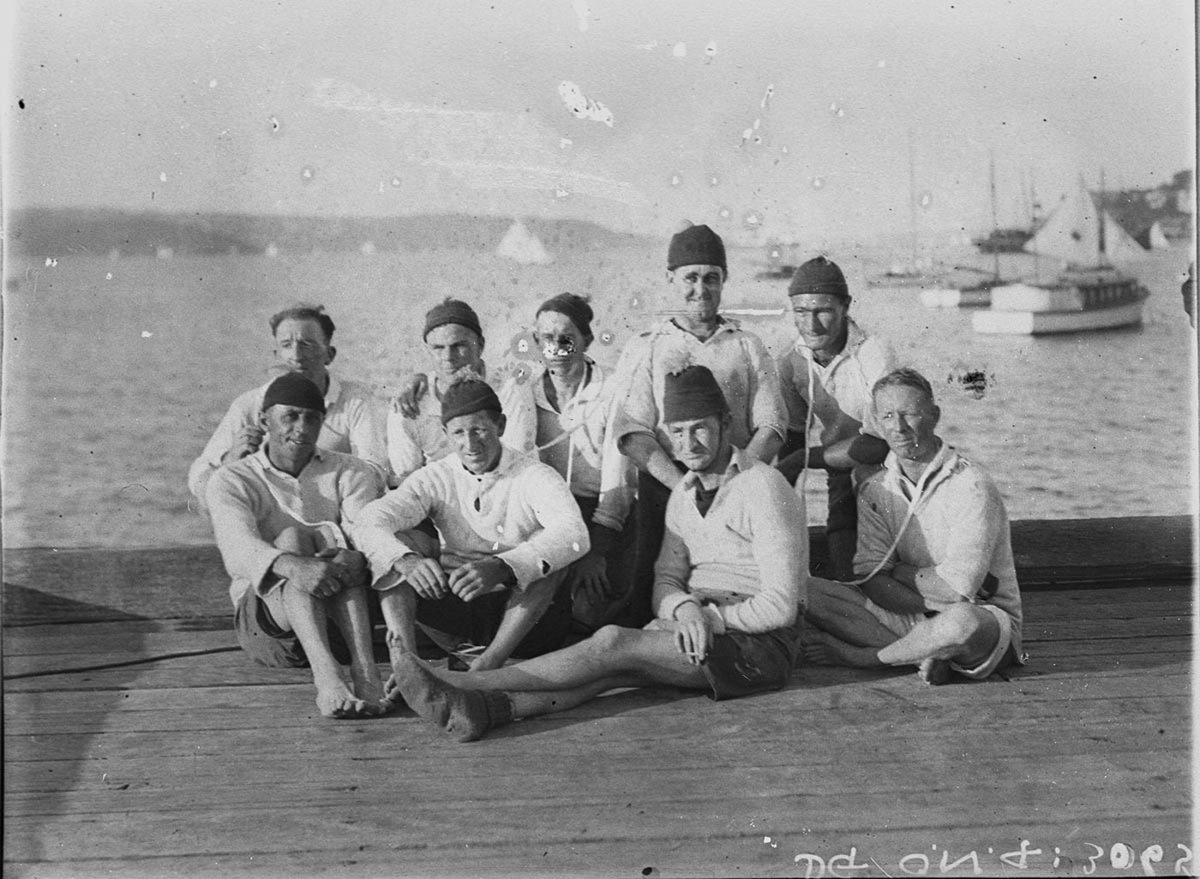 Crews relax on shore (1930s)