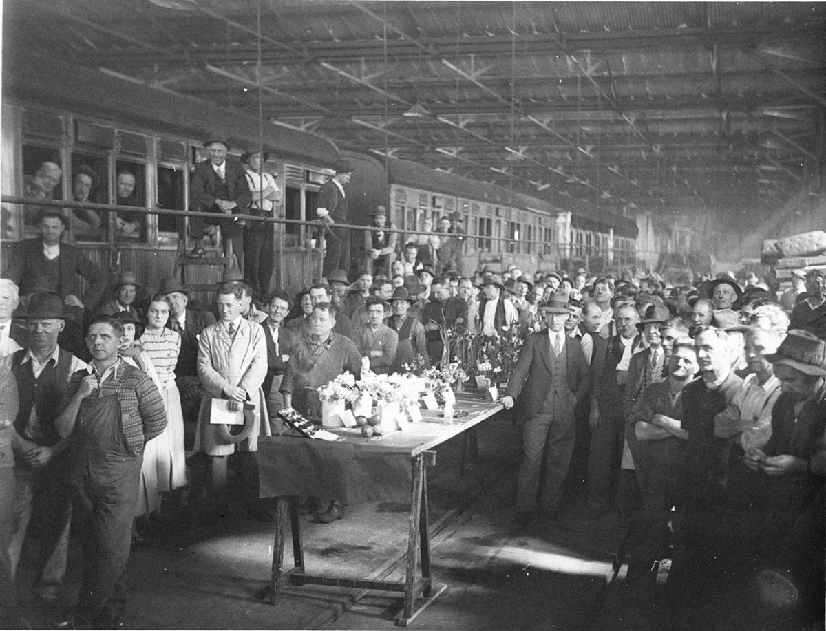 Crowd of flower fanciers listen to the results of the judges (c. 1934)