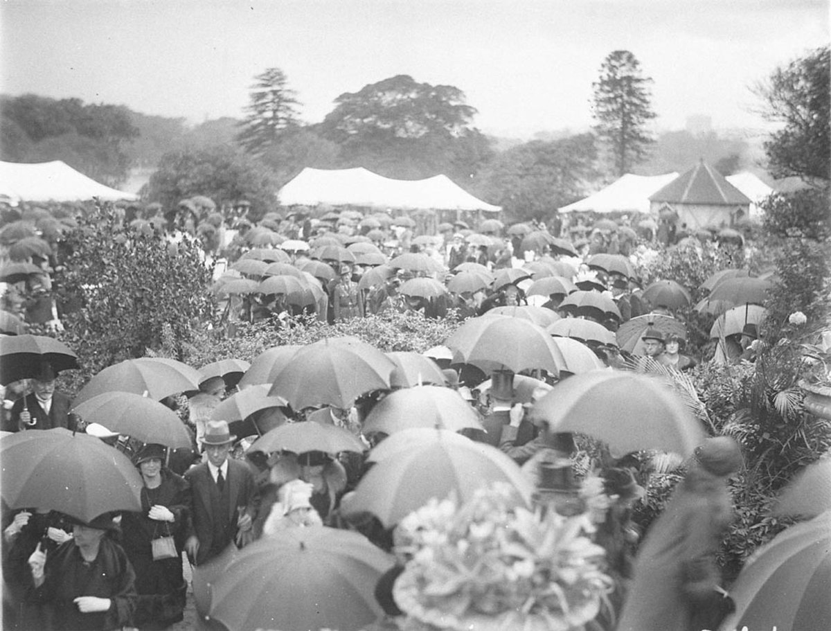 Crowds in the Domain with umbrellas (1927)