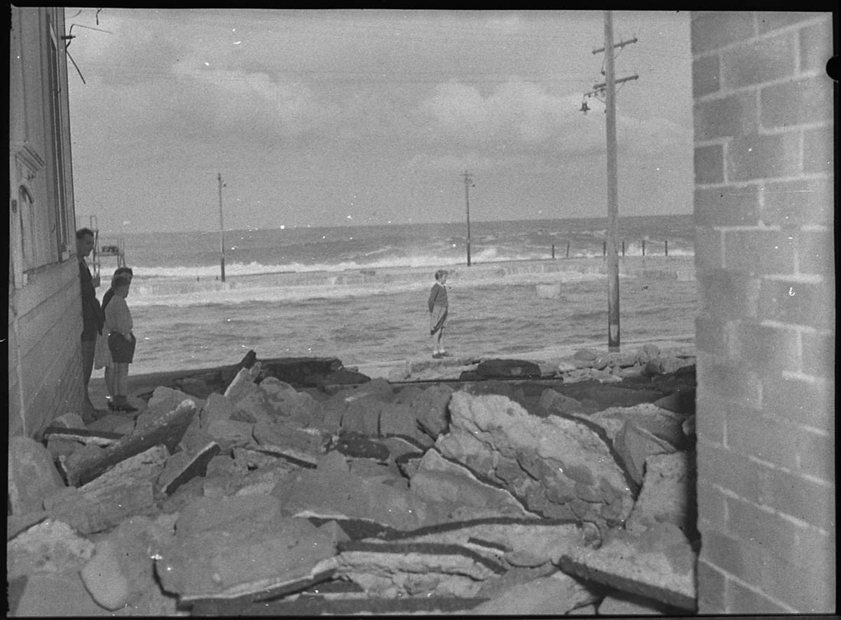 Damage to baths caused by heavy seas (1955)