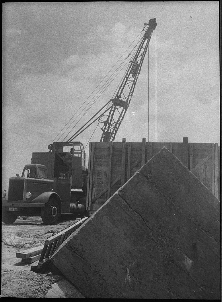 Dropping concrete blocks on breakwater (1954)