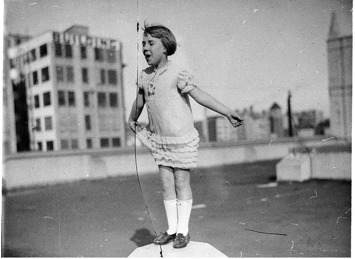 Eisteddfod competitor on rooftop (1930s)
