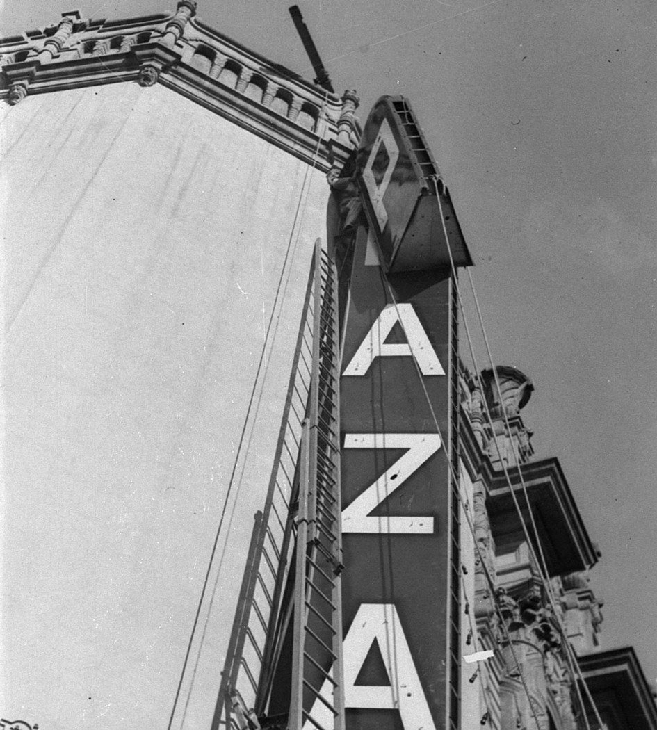 Erecting neon sign Plaza (c. 1935)