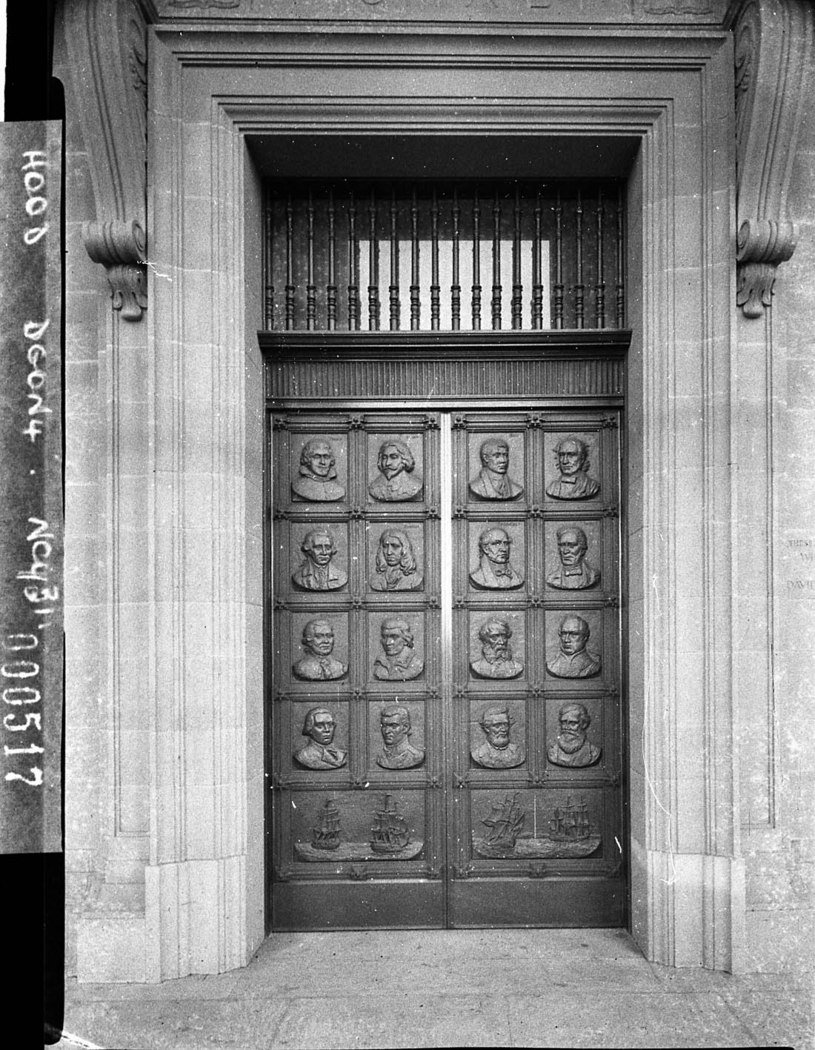 Exterior Public Library of NSW showing the bronze entrance doors embossed with heads of explorers, Sydney (1942)