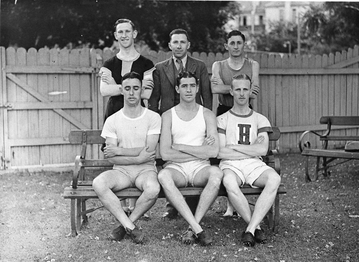 Five team members and their coach (1930s)