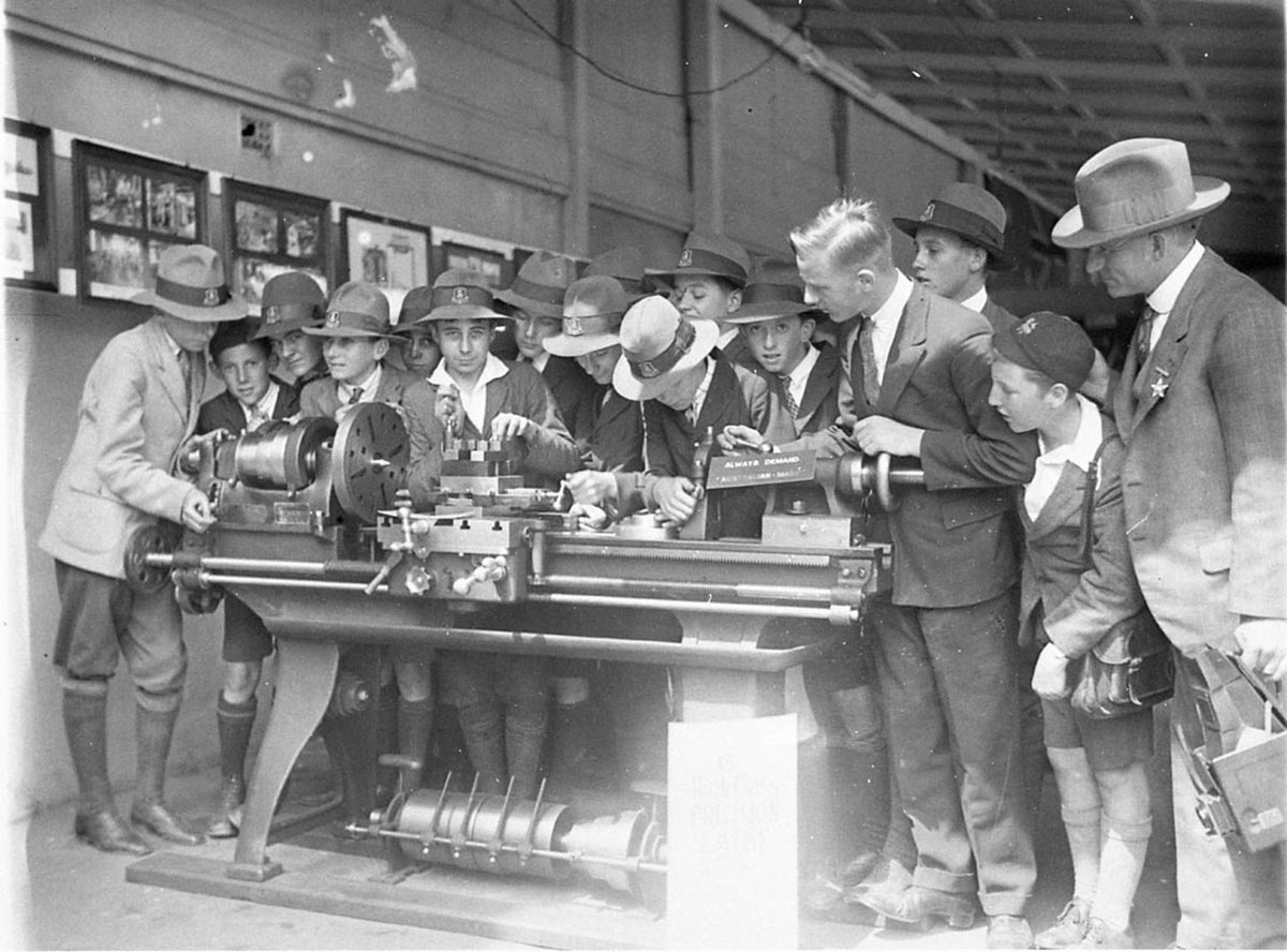 Fort Street schoolchildren being shown a lathe at the Australian Manufacturers Exhibition, Sydney (1927)