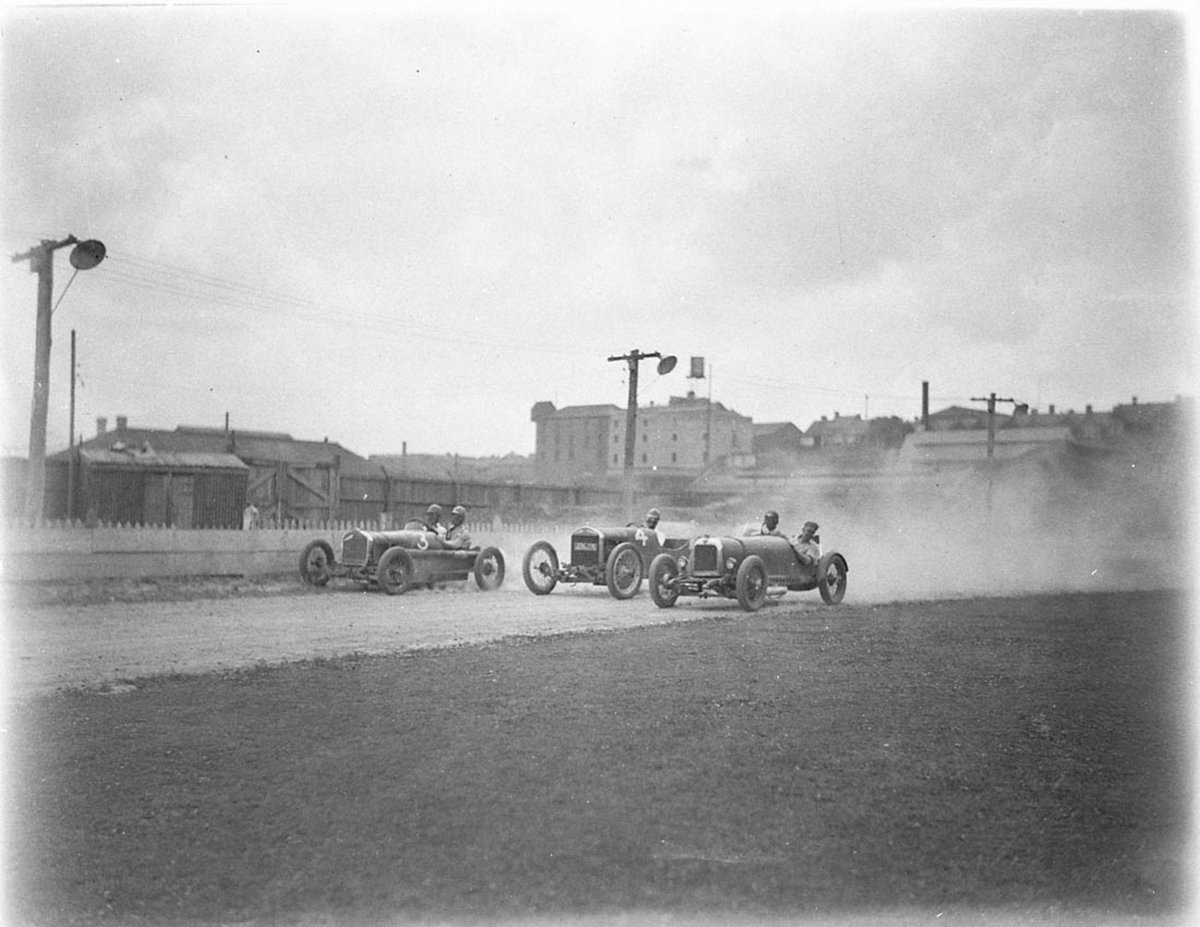 From right supercharged 1924 Alvis of Fred Braitling no4 registration no226276 is the Fronty Ford Special of Charlie Spurgeon and no3 is the Rajo Ford Special of Don Shorten taken for Cinesound Wentworth Autodrome Nov 1933