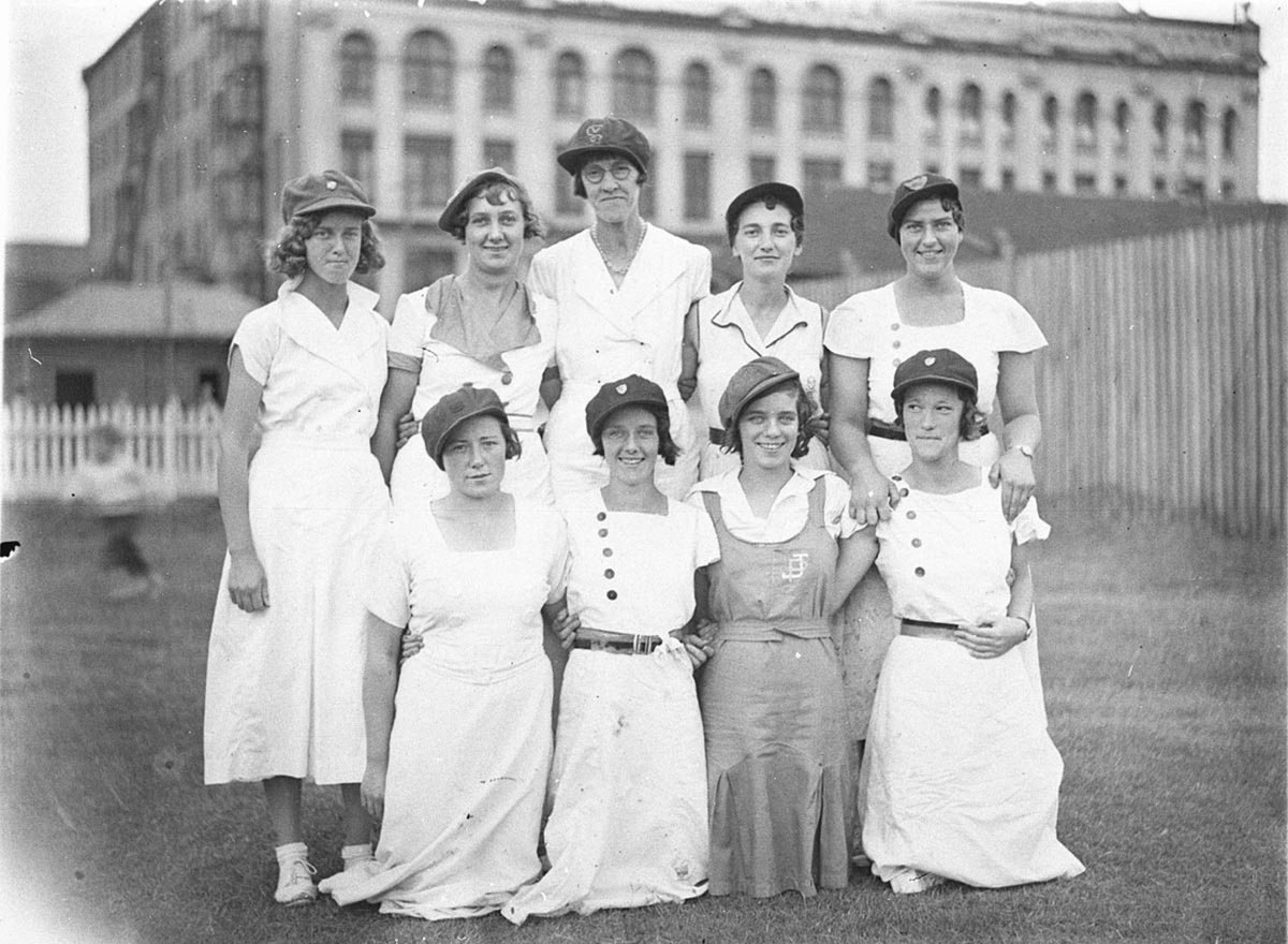 Group of nine vigoro players with V G in an S logo on caps (c. 1929)