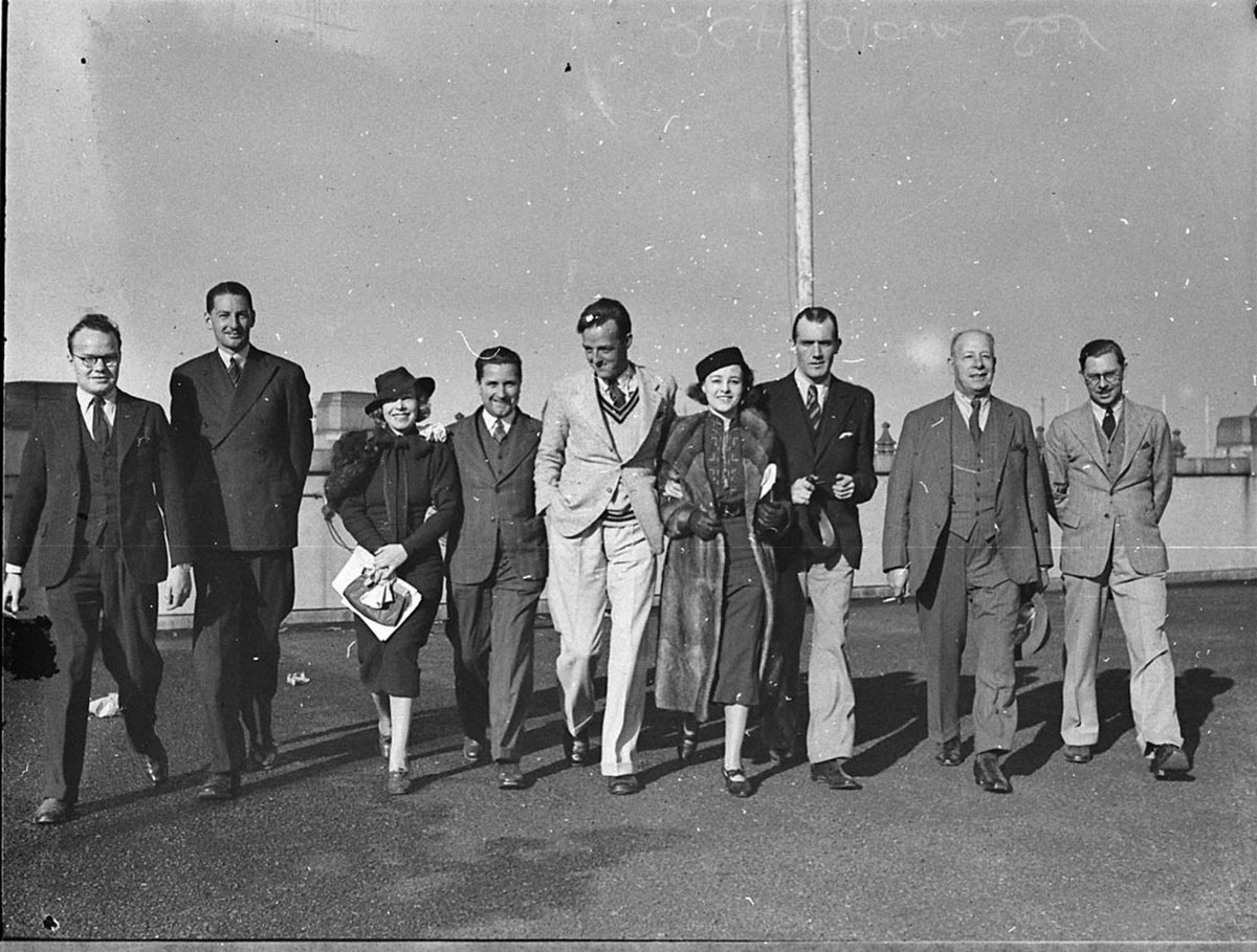 Group of people on the roof of a city building (1930s)
