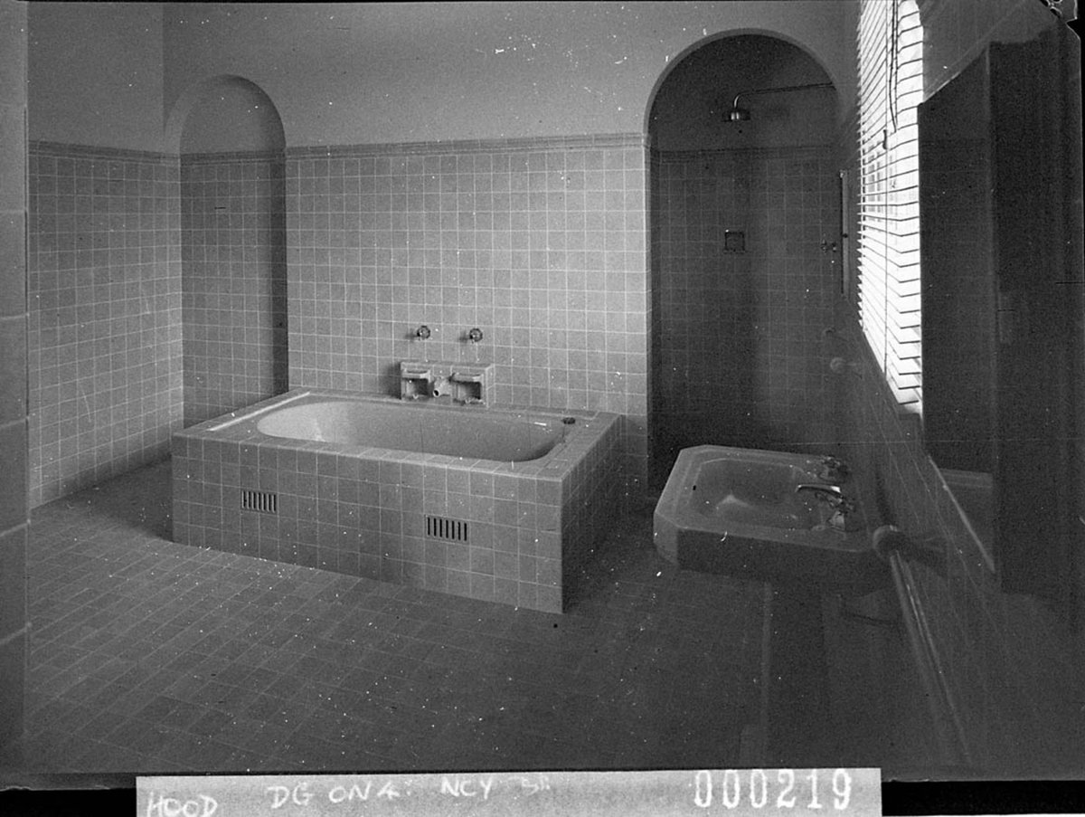 Guest bathroom with shower alcove Burnham Thorpe Gordon home of Mr Woolcott Forbes (1940)