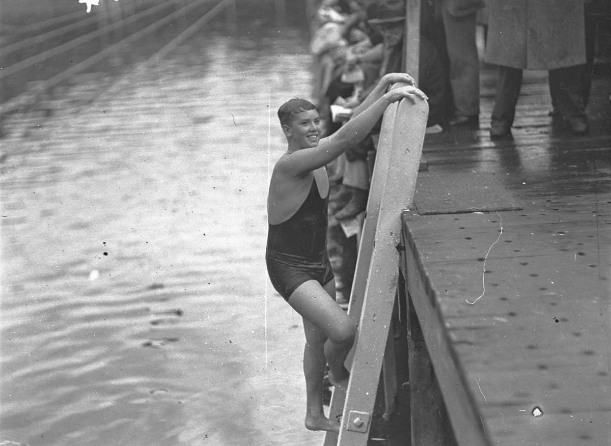 HR Biddulph of Rose Bay leaves the water after winning the under15 NSW championship Domain Baths (1935)