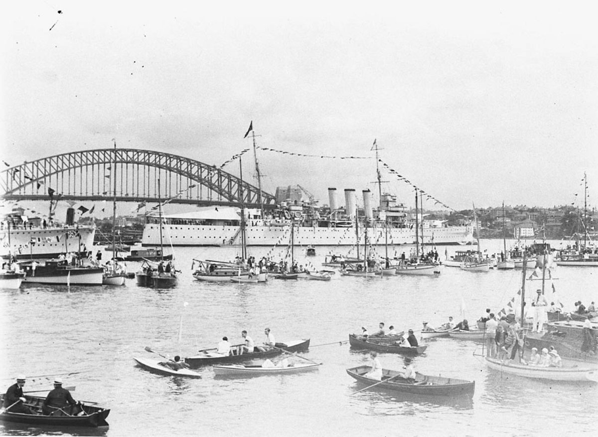 HMS Sussex behind the line of boats waiting for Gloucester royal barge (1934)