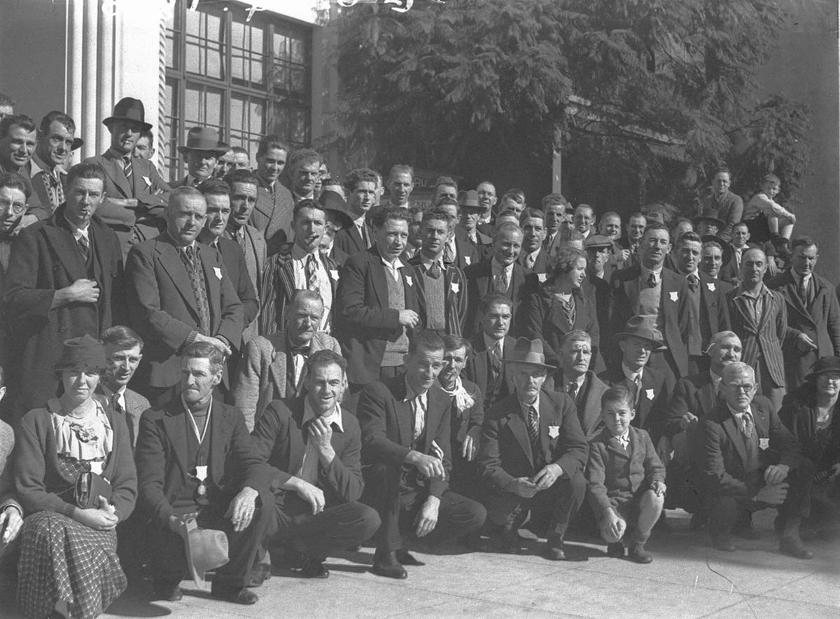 Large group of people outside building in Macquarie Street, Sydney city centre (1930s)