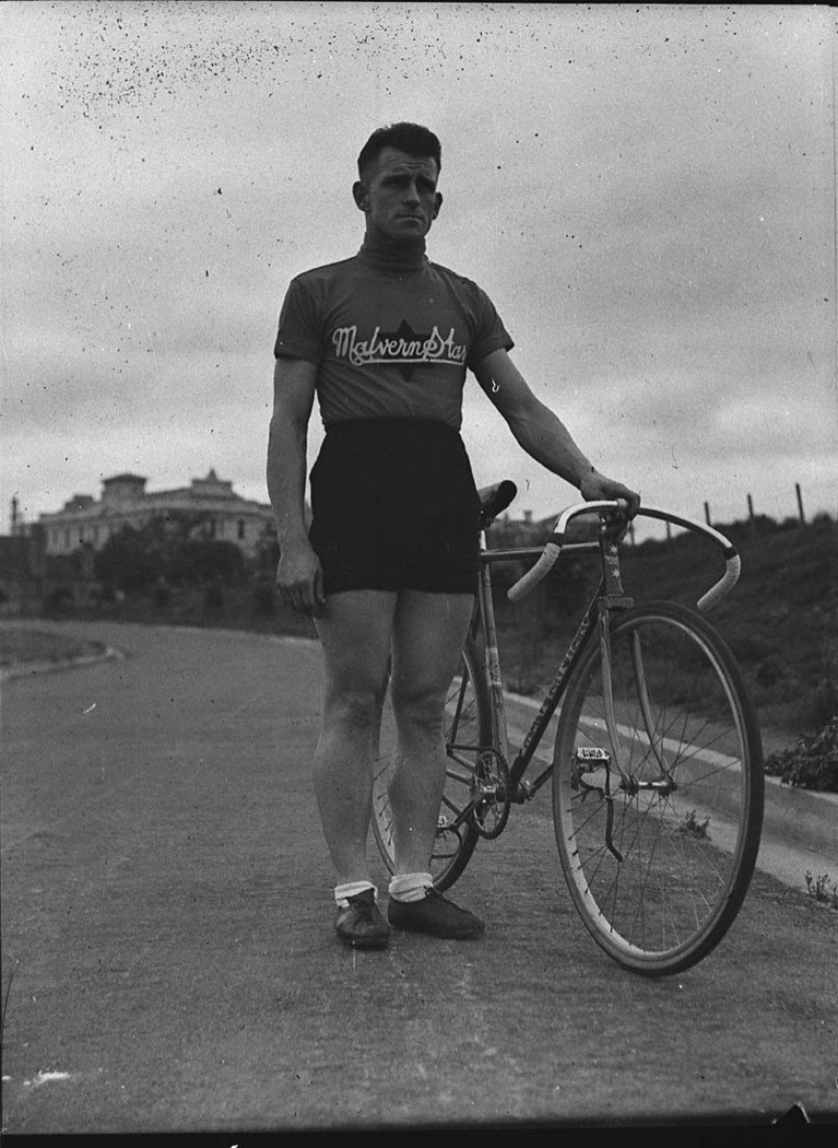 Len Rogers and bike taken for Bruce Small Ltd (1938)