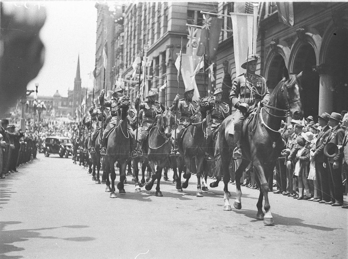 Light Horsemen lead the royal procession past the Cenotaph, Sydney city centre (c. 1934)