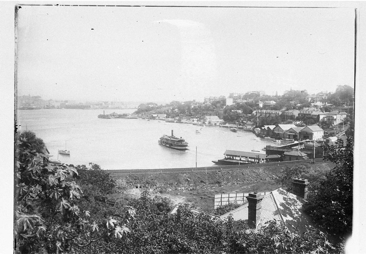 Looking towards Walsh Bay showing ferries leaving McMahons Point wharf and Lavender Bay wharf (1930s)