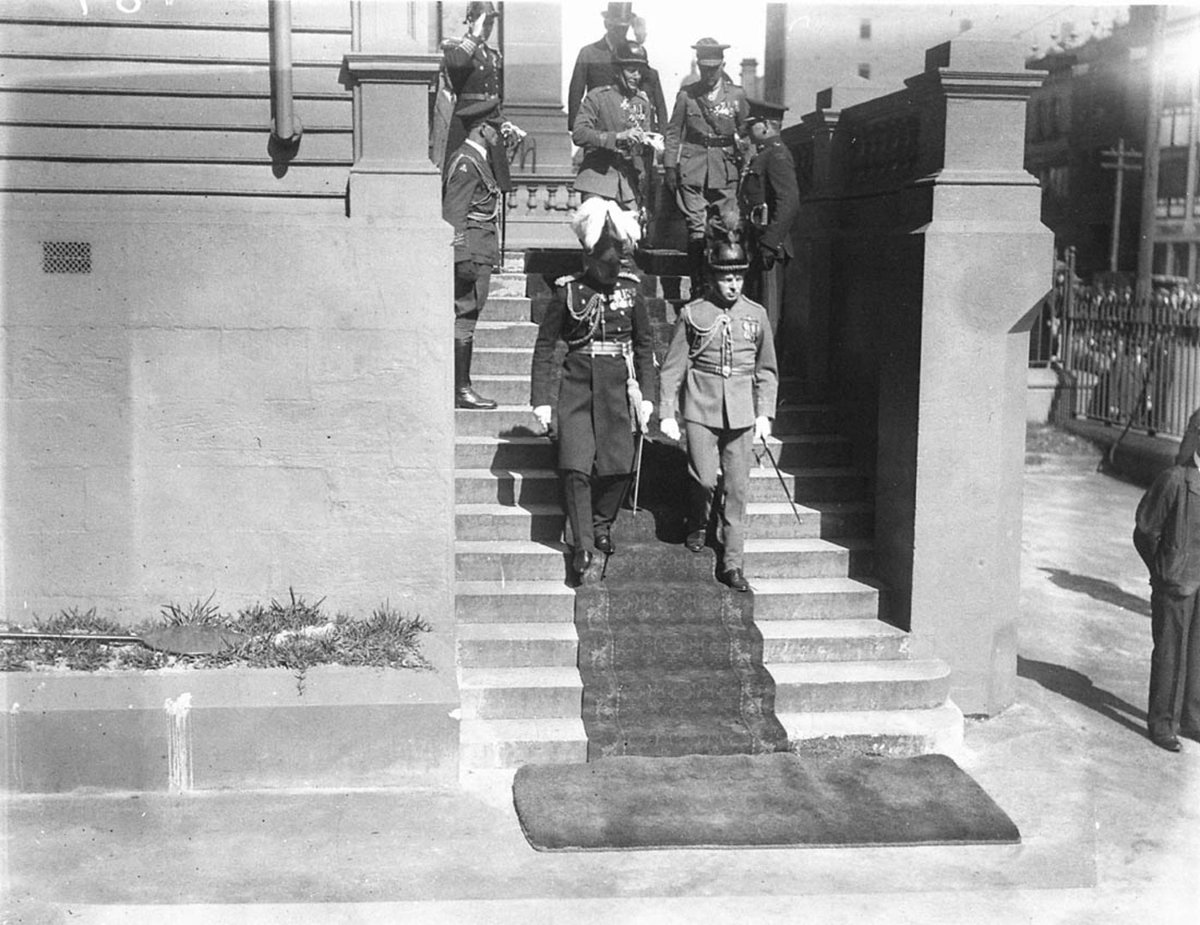 Lord Gifford precedes State Governor Sir Philip Game down the steps of Parliament House, Sydney city centre (1930s)