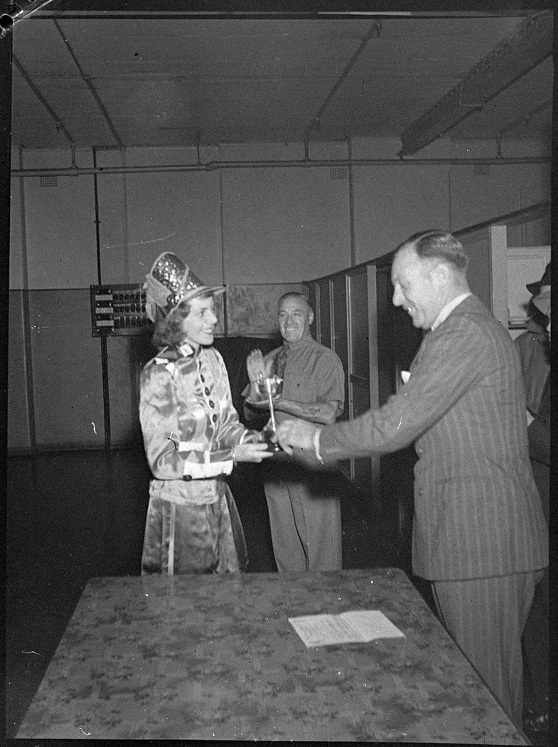 Marching team presentation of cups (1947)