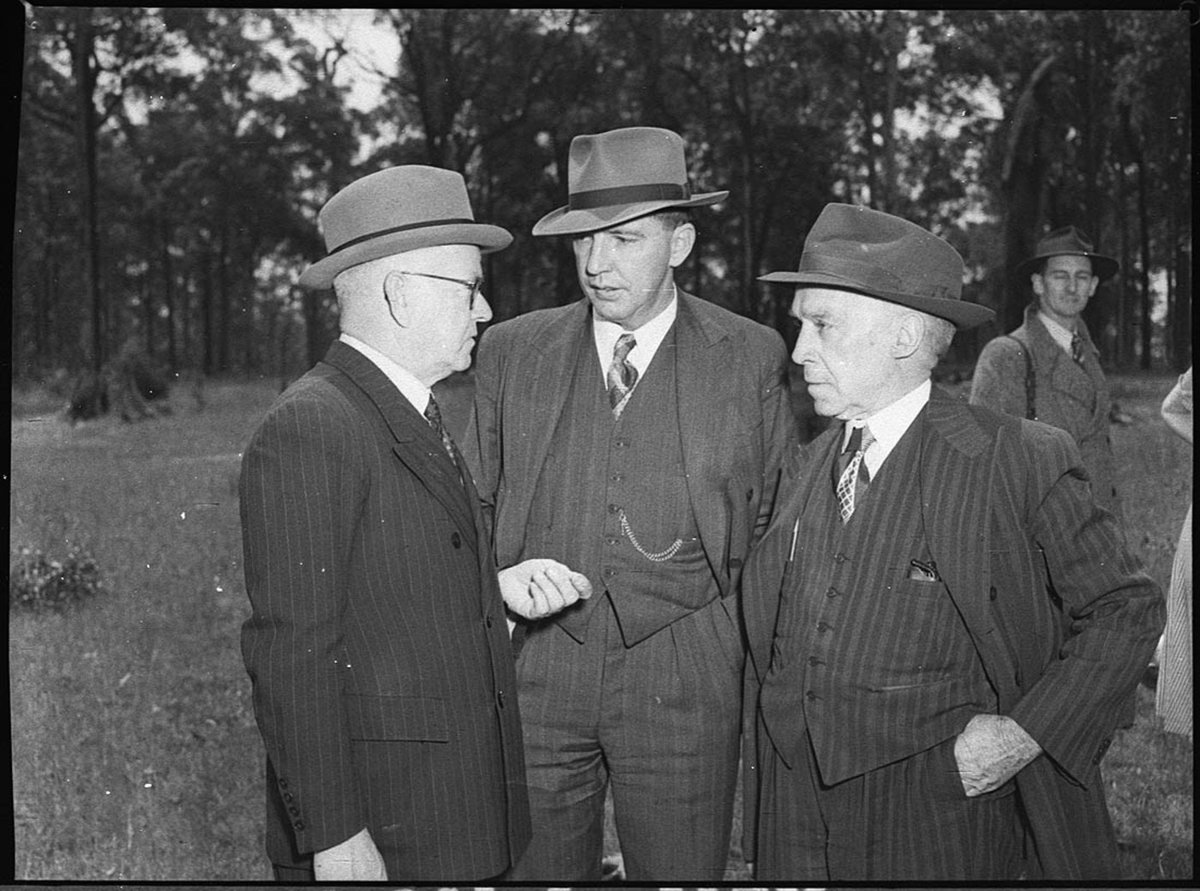 Mr Heffron Minister for Education inspects site of proposed University at Shortland (1950)